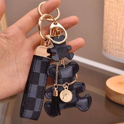 louis vuitton keychain lanyard|Louis Vuitton teddy bear keychain.